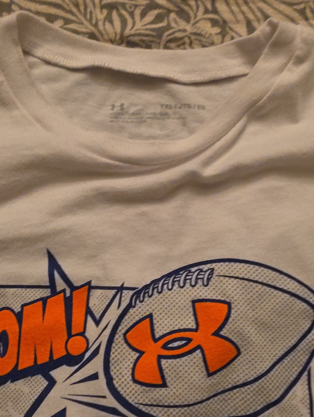 Under Armour White Long-Sleeve Tee with Orange & Blue Football Graphic
